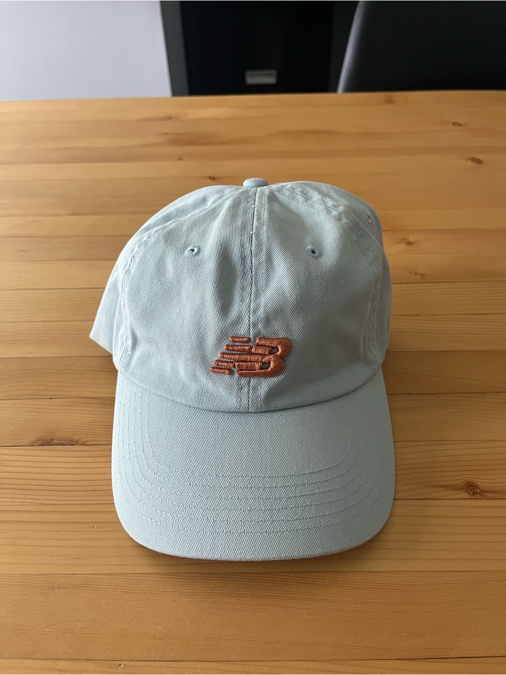 New Balance Light Blue Cap with Bronze Logo